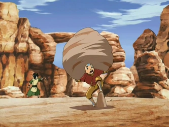 Aang_carries_a_rock.png